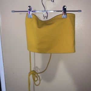 Yellow tube crossed back top